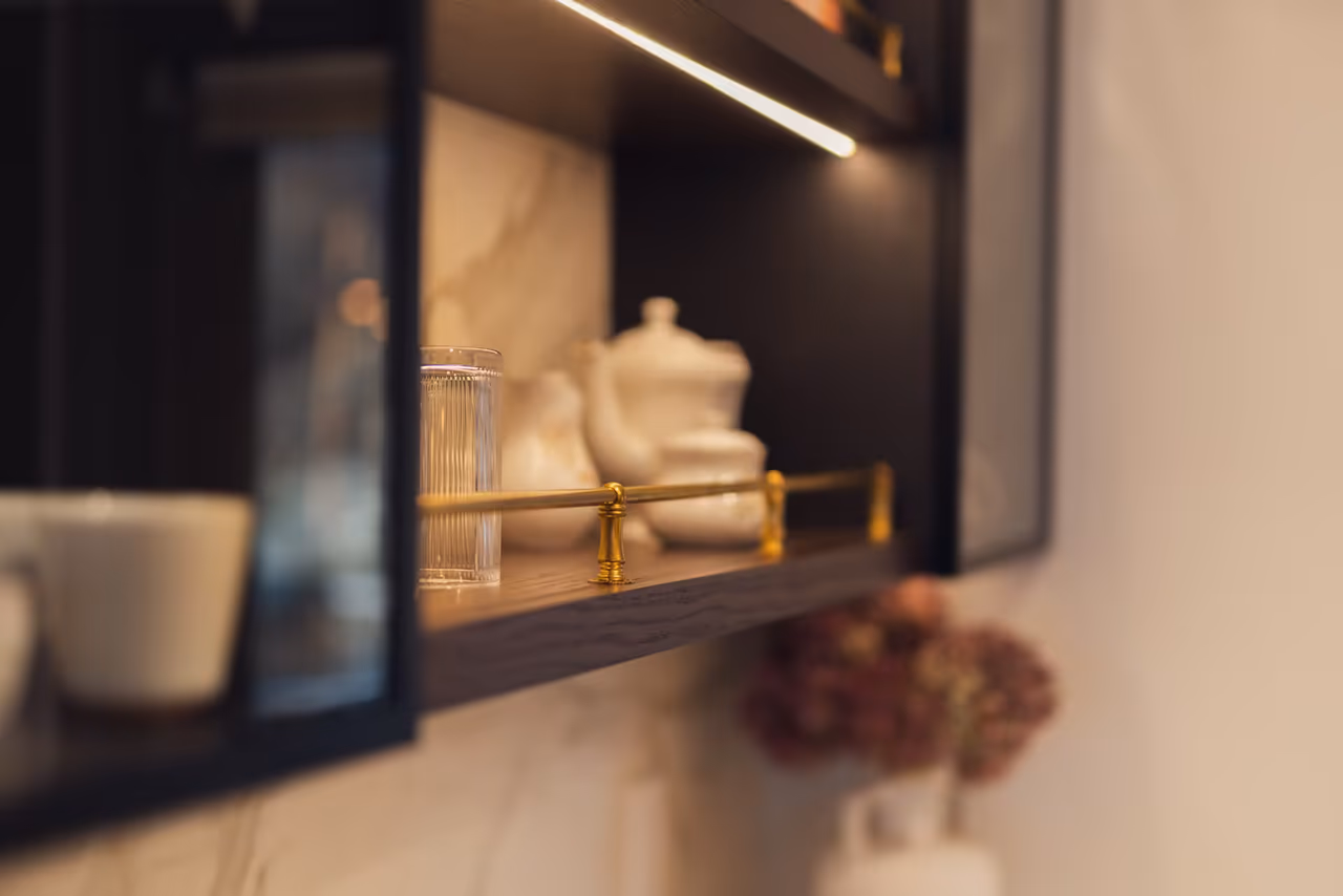 Custom cabinet detail with warm lighting in a finished Kelowna kitchen