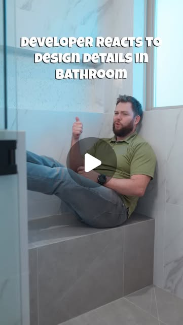 Nailed It team member pointing to a tiled bathroom niche in the original video